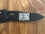 Benchmade Contego, customized with a laser etching of Scott and G, created by Scott H, 1999